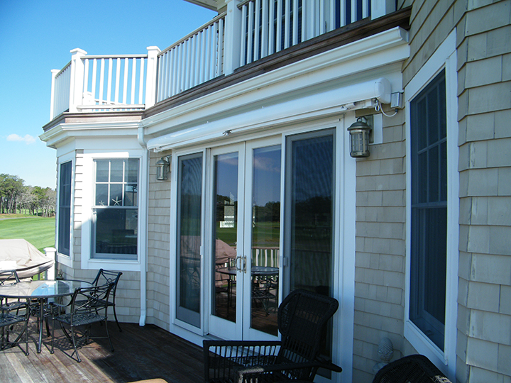 a deck with the pergola closed